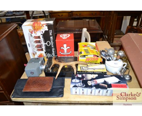 An Oriental lacquered trinket box; a vintage cine camera; a feeding cup and various other decorative items