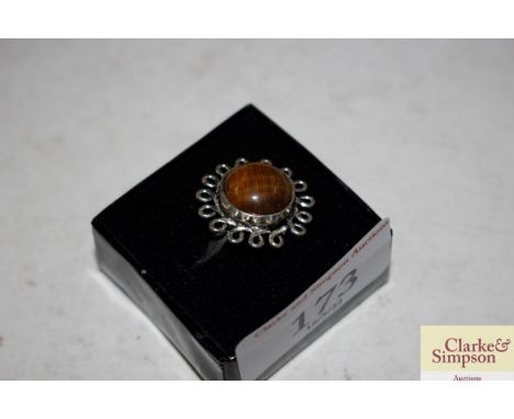 A tiger's eye and white metal dress ring 