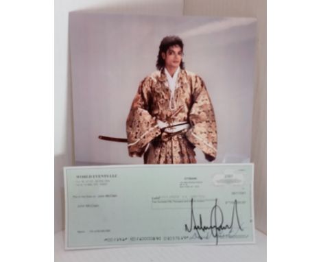 Michael Jackson signed Cheque No 2391 to John McClain dated 09/17/2001 with photograph

 