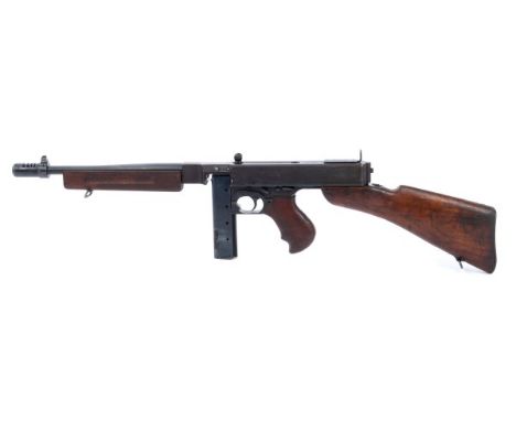 Deactivated Thompson 1928 A1 . 45ACP submachine gun with smooth outer barrel, Lyman battle sight and Cutt's compensator, deta