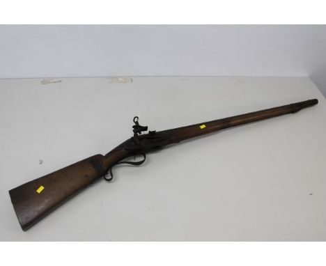 18th century Spanish miquelet-lock carbine, iron barrel with raised rib and engraved scroll trigger guard, full length walnut