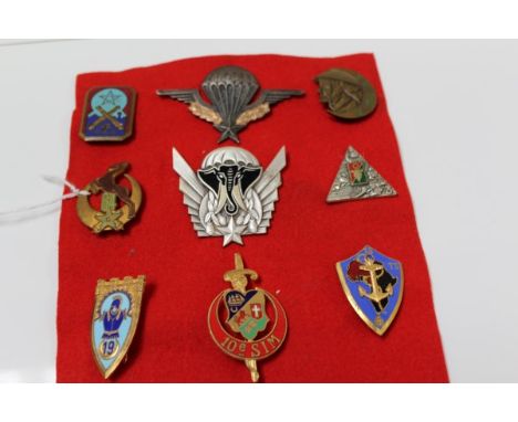 Nine assorted French and Foreign Legion enamel badges