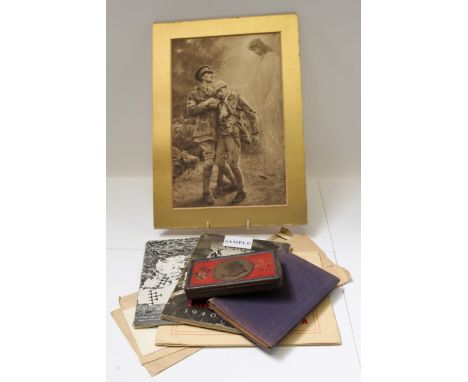 Boer War chocolate tin, First World War peaked cap, two Soviet military hats, together with various First and Second World Wa