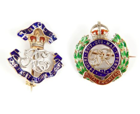 Two gold (9ct) and enamel Royal Engineers sweetheart brooches, one by Garrard & Co., in original red leather box