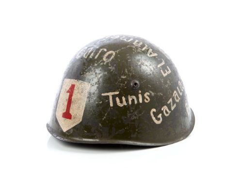 Rare Second World War Italian Fascist Infantry helmet War trophy, with original green paint decorated with divisional badges 