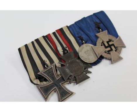 First / Second World War German medal group, comprising - First World War Iron Cross Second Class, Cross of Honour 1914 - 191