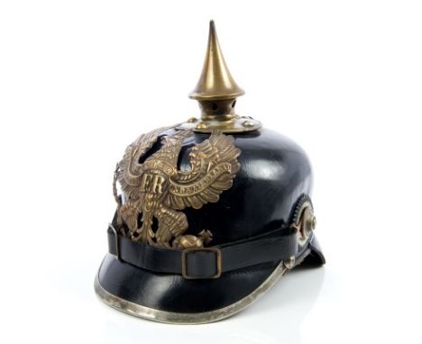 First World War Imperial German Infantry pickelhaube with leather skull, brass Prussian eagle helmet plate and spike, leather