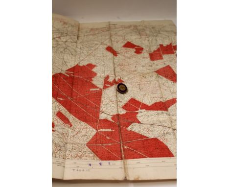 First World War canvas trench map, dated 1918, together with a 1914 On War Service badge CONDITION REPORT Some splits along c