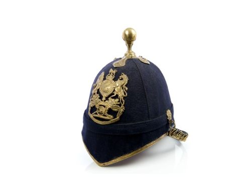 Edwardian blue cloth Royal Artillery helmet with ball finial, Royal Artillery helmet plate, original lining and chin chains