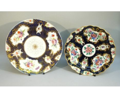 A WORCESTER STYLE REGENCY BONE CHINA CIRCULAR SHAPED DISH WITH A SCALLOP RIM PAINTED WITH RESERVES OF FLOWERS, GILT ENRICHED 