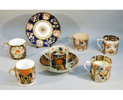 A REGENCY IMARI PATTERN COFFEE CAN AND SAUCER, No. 561 IN GILT, POSSIBLY WORCESTER, ANOTHER COFFEE CAN, A SAUCER, A DERBY IMA