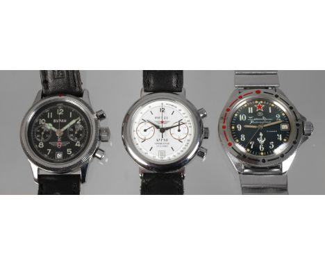 Drei russische Armbanduhren2. Hälfte 20. Jh., dabei Chronograph BURAN MIG 29, Werk mit Handaufzug und 23 Steinen, Stoppfunkti