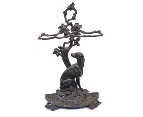 Victorian Cast Iron Stick Stand Victorian Coalbrookdale style cast iron stick or umbrella stand, the back modelled as a dog s