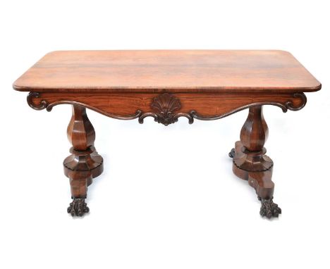 Victorian Rosewood Library Table Victorian rosewood library table, rounded rectangular top, shaped frieze with two short draw