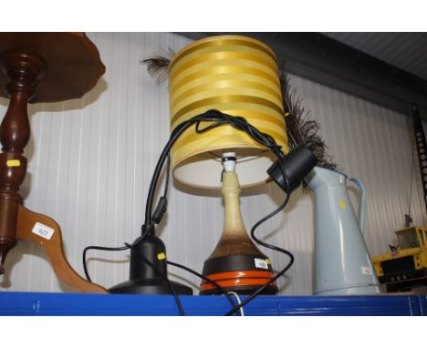A retro pottery table lamp and a modern Angle Poise