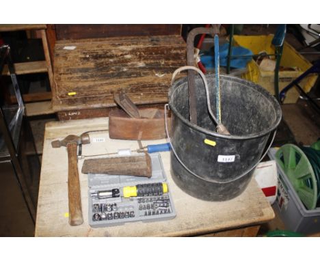 A plastic bucket and contents of various hand tools 