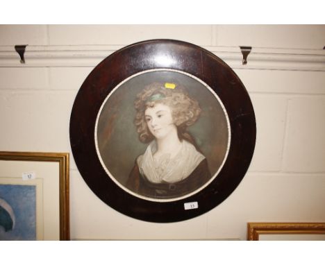 A circular portrait of a young lady 