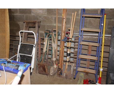 A quantity of various gardening tools; sash clamp etc.