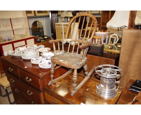 An elm seated child's stick back rocking chair 