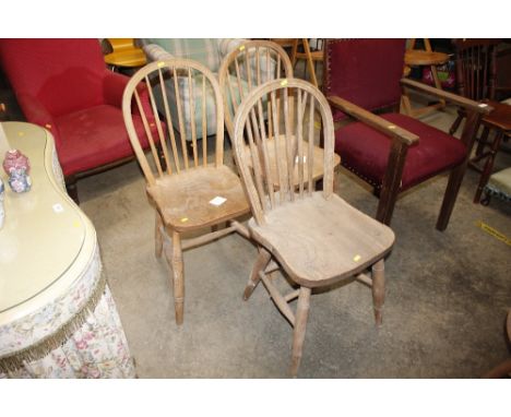 Three elm seated stick back kitchen chairs