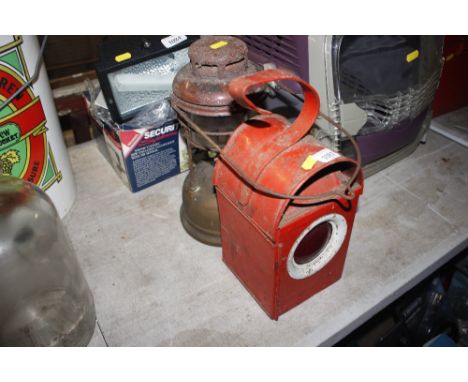 A hurricane lamp; and a road side warning lamp