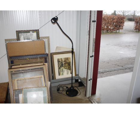 A black Angle Poise standard lamp