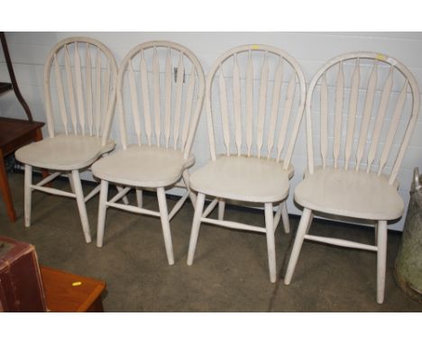 A set of four painted stick back kitchen chairs 