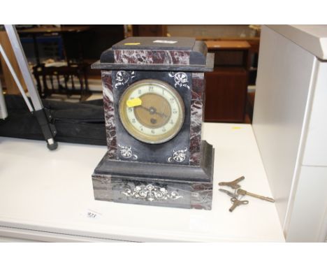 A Victorian marble cased mantel clock