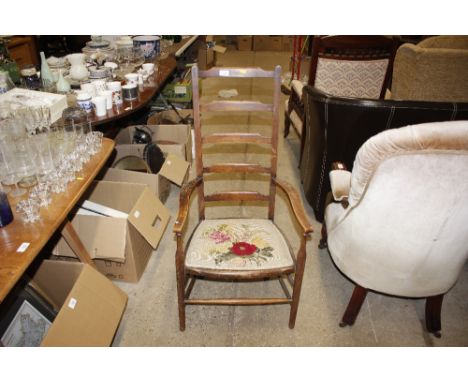A beech ladder back elbow chair 