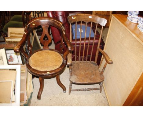 A 19th Century elm stick back armchair, reduced; and an Edwardian revolving desk chair  AF