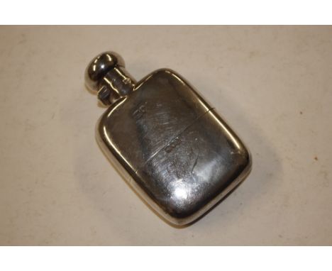 A silver hip flask with detachable cup bearing monogram "Evelyn"