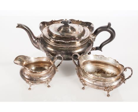 SCOTTISH SILVER THREE-PIECE TEA SERVICE
maker Hamilton & Inches, Edinburgh 1922, approximately 1294g, teapot 14cm high