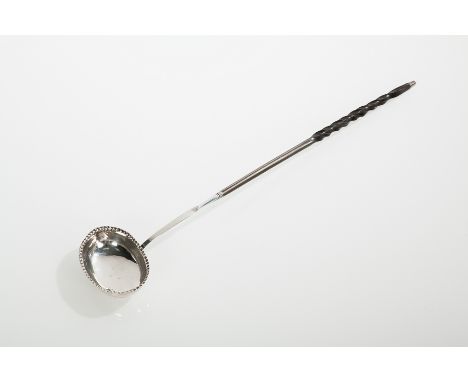 GEORGE III SILVER TODDY LADLE
makers mark rubbed, London 1792, with baleen handle, missing silver tip, bowl with gadrooned ri