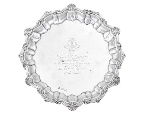 An Edward VII Silver Waiter, by Horace Woodward and Co. Ltd., London, 1905, shaped circular and on three tapering legs, with 
