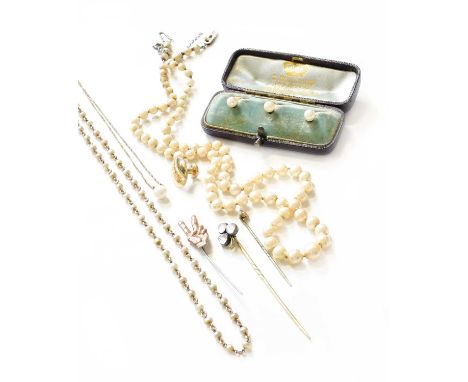 Three Cultured Pearl Studs, stamped '18', cased; A Single Dress Stud, stamped '18'; Two Cultured Pearl Necklaces, length 47cm