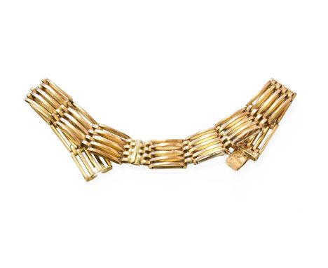 A Gate Link Bracelet, tongue and each link stamped '15C', length 16.5cmGross weight 11.8 grams.