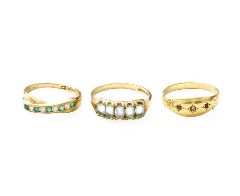 A 9 Carat Gold Aquamarine Five Stone Ring, finger size R; A 9 Carat Gold Emerald and Cubic Zirconia Half Hoop Ring, finger si