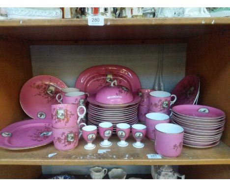 An Aynsley Porcelain Breakfast Service, circa 1880, pink ground and decorated in the aesthetic style with landscapes within p