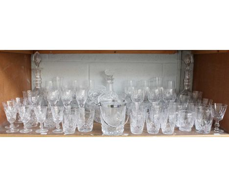 An Assembled Suite of Glassware, including a pair of decanters, a single decanter, a pair of navette form bowls, an ice bucke