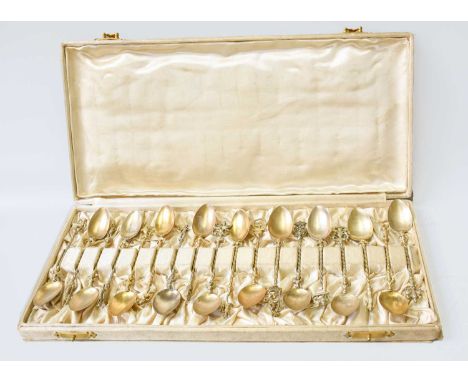 A Cased Set of Eighteen Continental Silver-Gilt Spoons, Each Stamped '800', Possibly Italian, Late 19th Century, with various