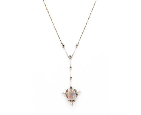 An Edna May opal and diamond pendant, c.1915,with an oval cabochon opal, with strong orange-red-green-blue play of colour, wi