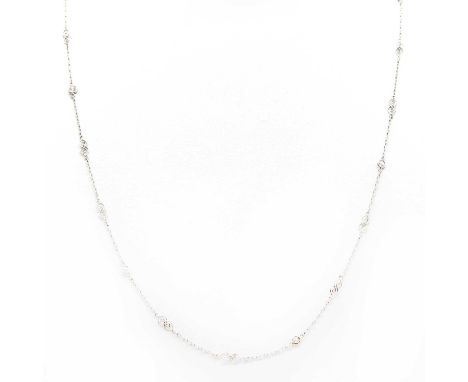 A Belle Epoch style diamond set long chain,with brilliant cut diamonds, milligrain set to spectacle settings. The diamonds ev
