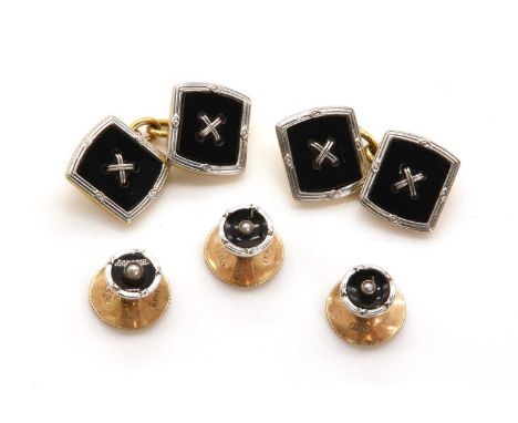 A cufflink and dress stud matched dress set, with a pair of chain link cufflinks and three dress studs. The tonneau shaped cu