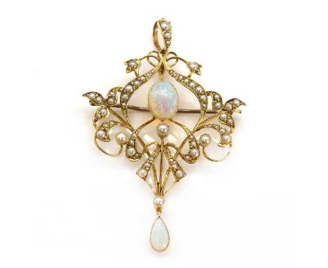 An Edwardian opal and split pearl Art Nouveau scrolling brooch/pendant,an open whiplash style frame, with an oval cabochon op