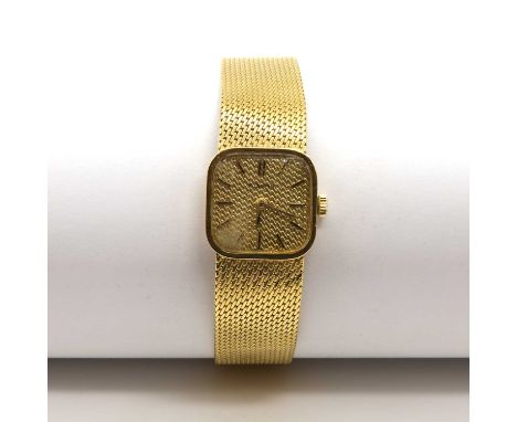 A ladies' 18ct gold Eterna mechanical bracelet watch,with a cushion shaped case. A gold textured dial, with gilt and black ha