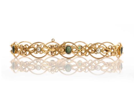 An Edwardian green tourmaline and split pearl gold bracelet, with a series of open oval wire links, each with a split pearl o