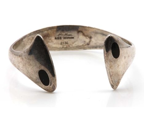 A sterling silver and black enamel torque bangle, by Hans Hansen,no. 213E, designed by Bent Gabrielsen, of tapered 'D' sectio