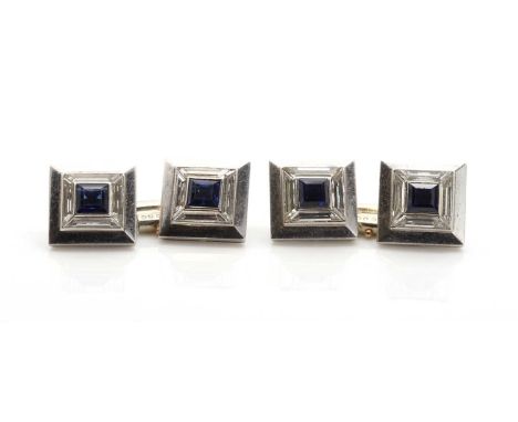 A set of four French Art Deco platinum, sapphire and diamond buttons, with later French white gold cufflink fittings. Each bu