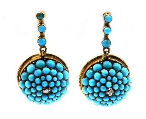 A pair of Victorian diamond and turquoise drop earrings,with a circular domed boss. A cushion cut diamond, surrounded by rows