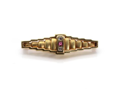 A ruby and diamond bar brooch,of geometric stepped form with a square calibré cut ruby, rub set to the centre, with square cu